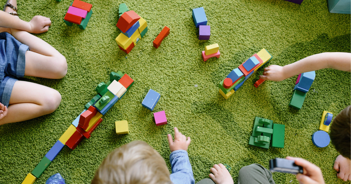 Toddlers playing image from Canva